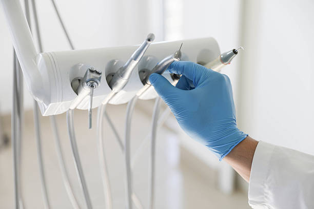Professional Tooth Extraction technician working in La Crosse, WI
